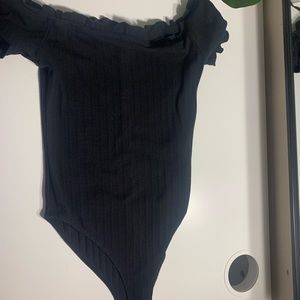 Two bodysuit one in maroon and the other one in black